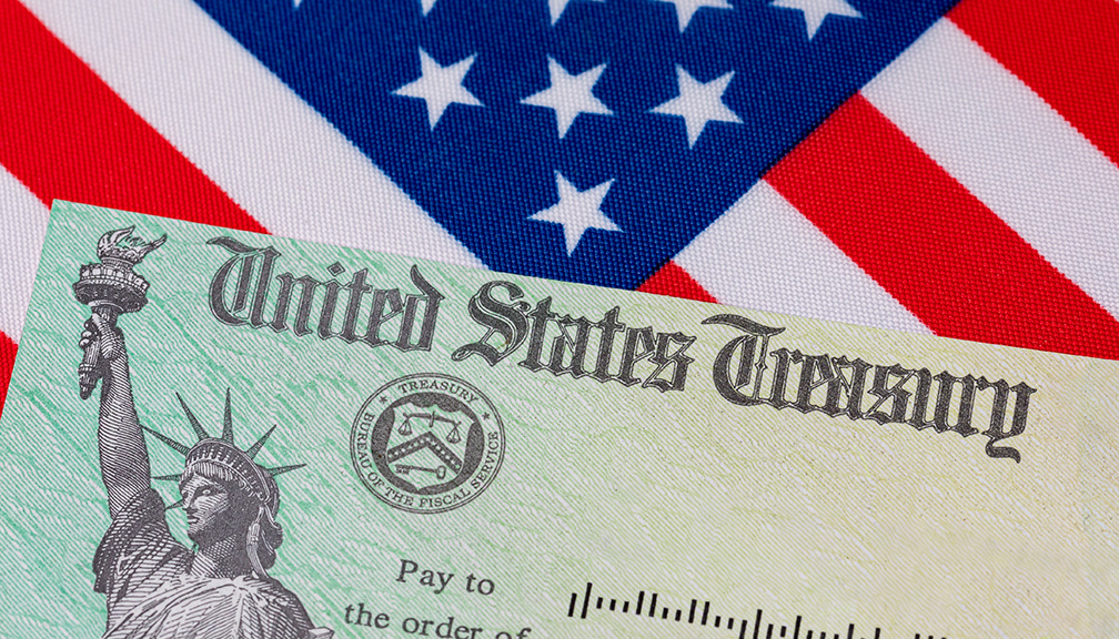 Photo of U.S. Flag With Check From Treasury