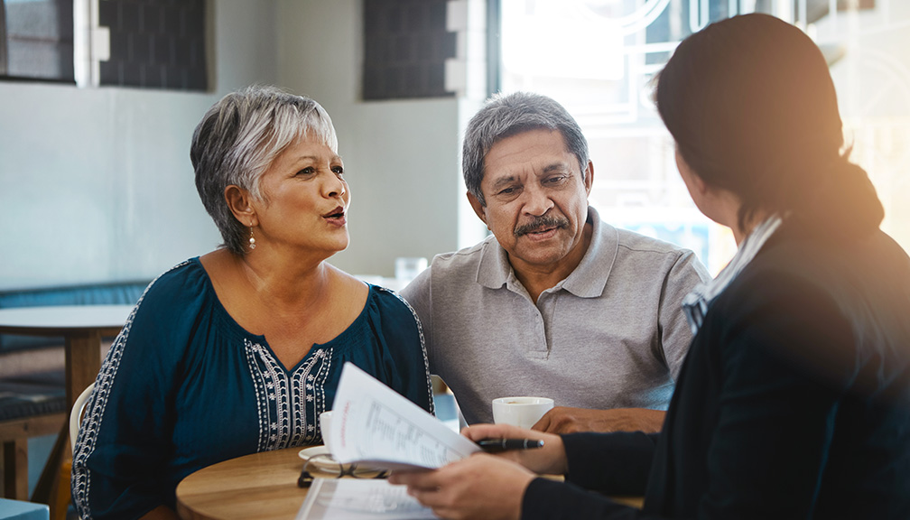 Photo of Couple in Discussion With Representative Over Important Matters